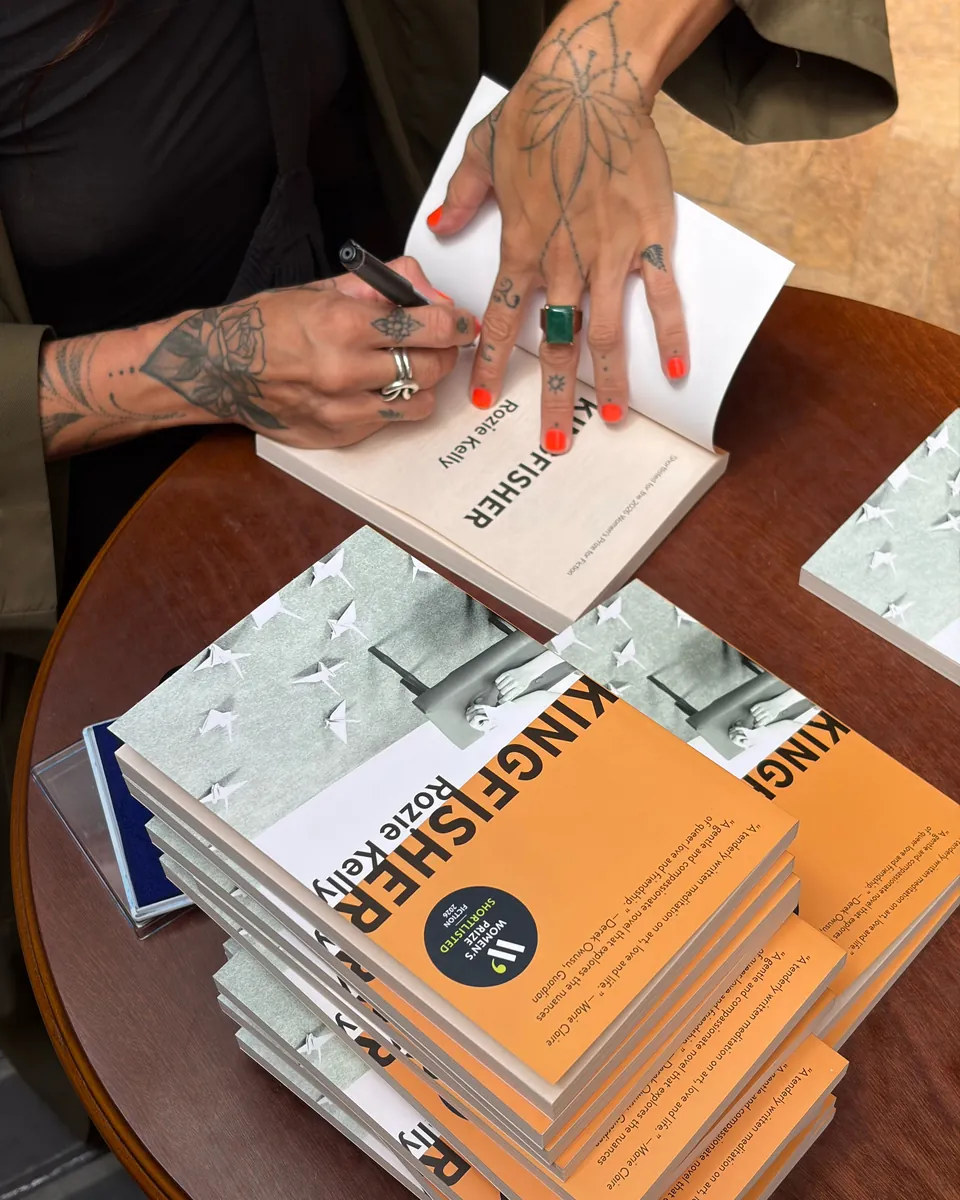 Rozie Kelly signing copies of Kingfisher